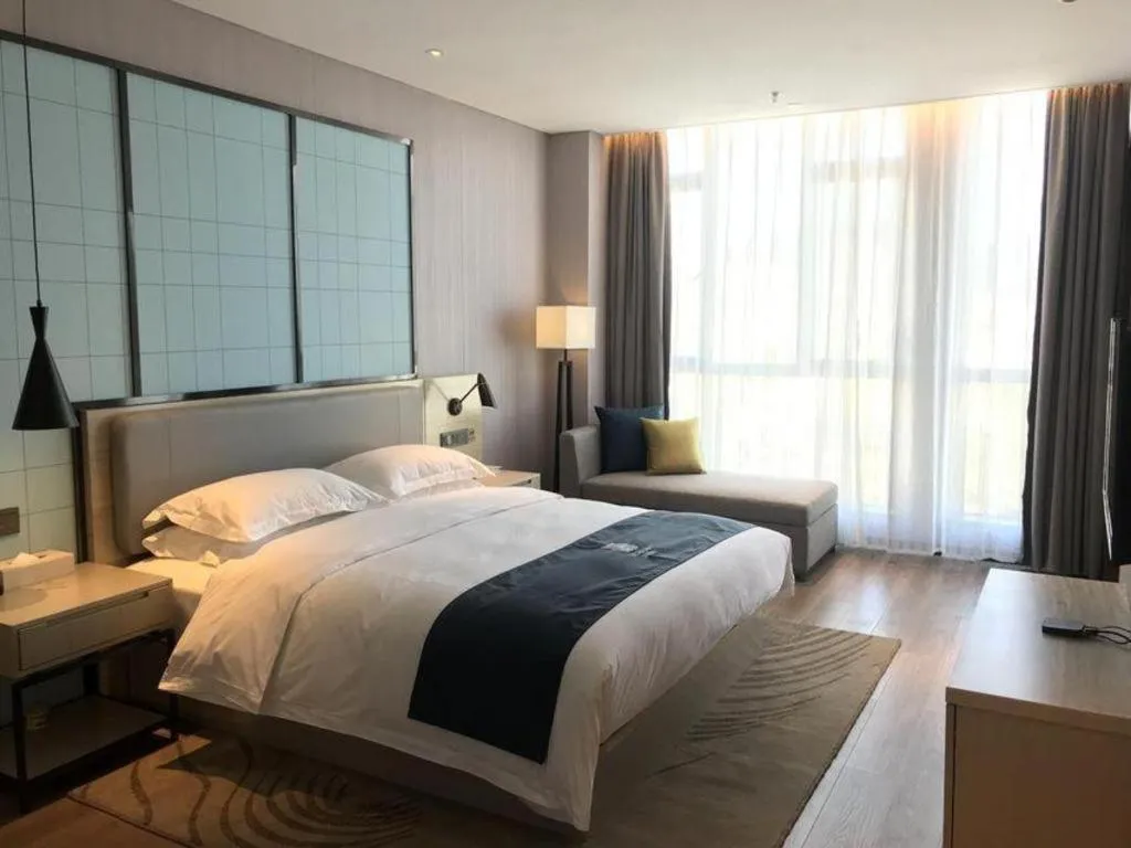 Bed in Echarm Hotel An'xi Hengxing Coach Station