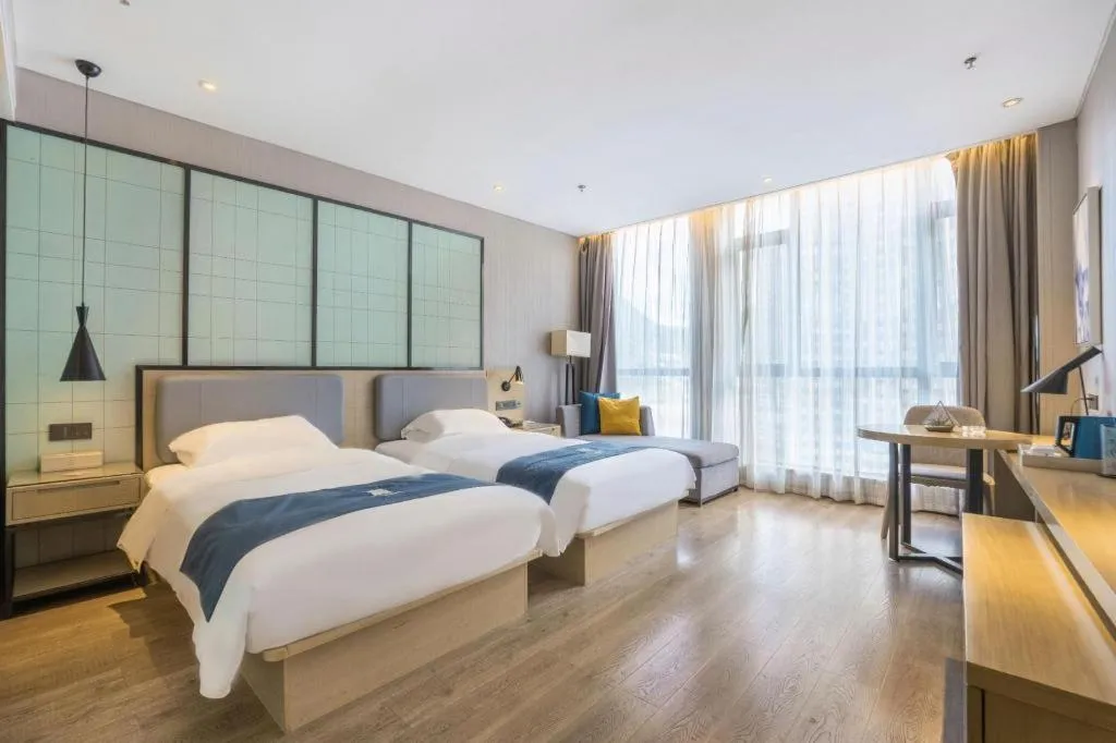 Bed in Echarm Hotel An'xi Hengxing Coach Station