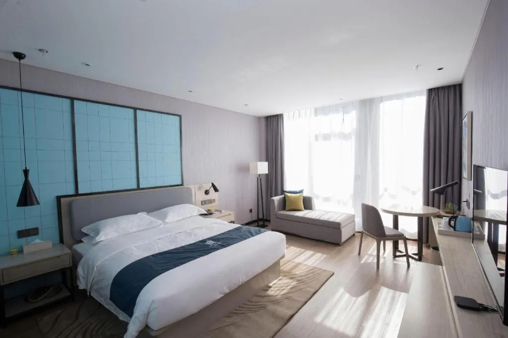 Bed in Echarm Hotel An'xi Hengxing Coach Station