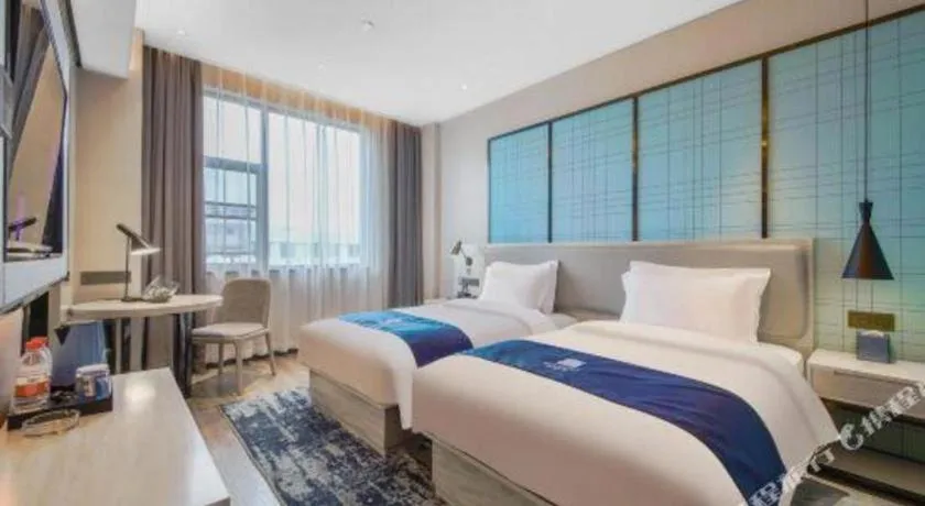 Bed in Echarm Hotel An'xi Hengxing Coach Station