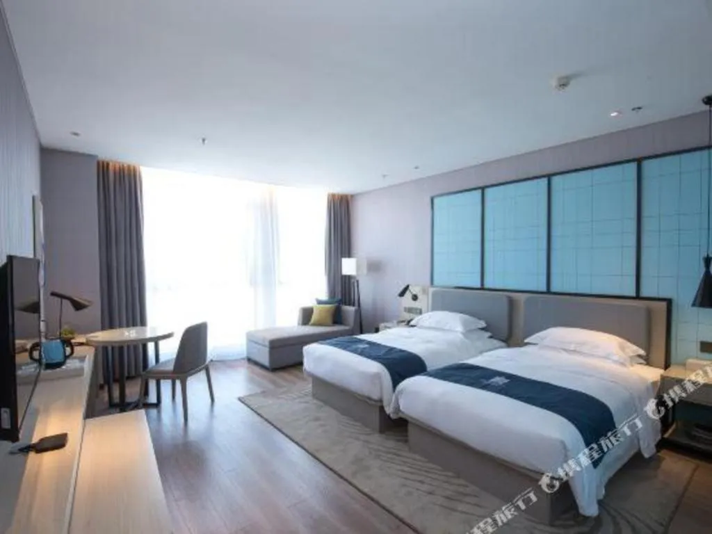 Bed in Echarm Hotel An'xi Hengxing Coach Station