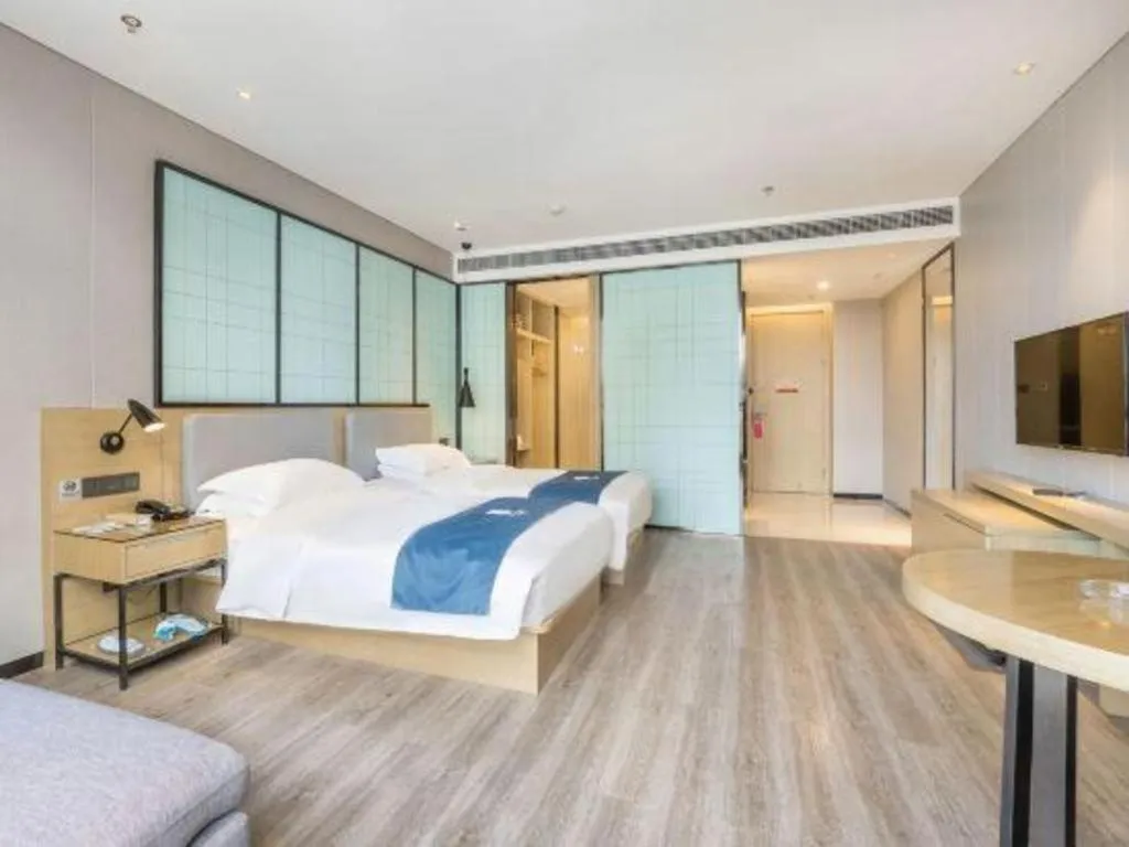 Bed in Echarm Hotel An'xi Hengxing Coach Station