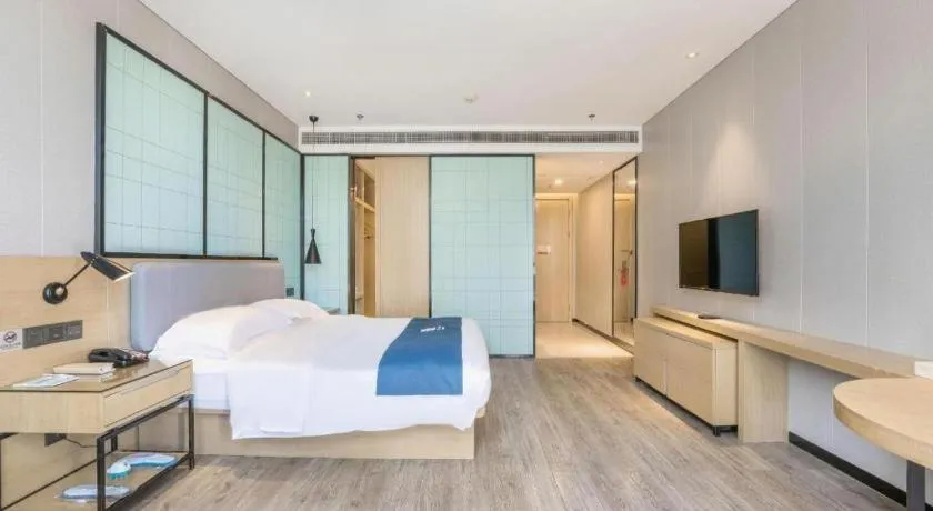 Bed in Echarm Hotel An'xi Hengxing Coach Station