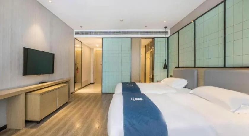 Bed in Echarm Hotel An'xi Hengxing Coach Station