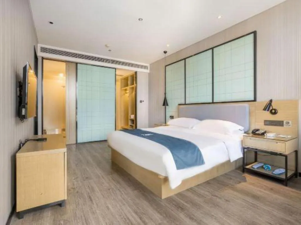 Bed in Echarm Hotel An'xi Hengxing Coach Station