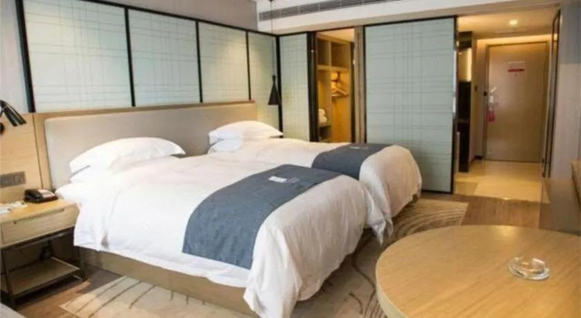 Bed in Echarm Hotel An'xi Hengxing Coach Station