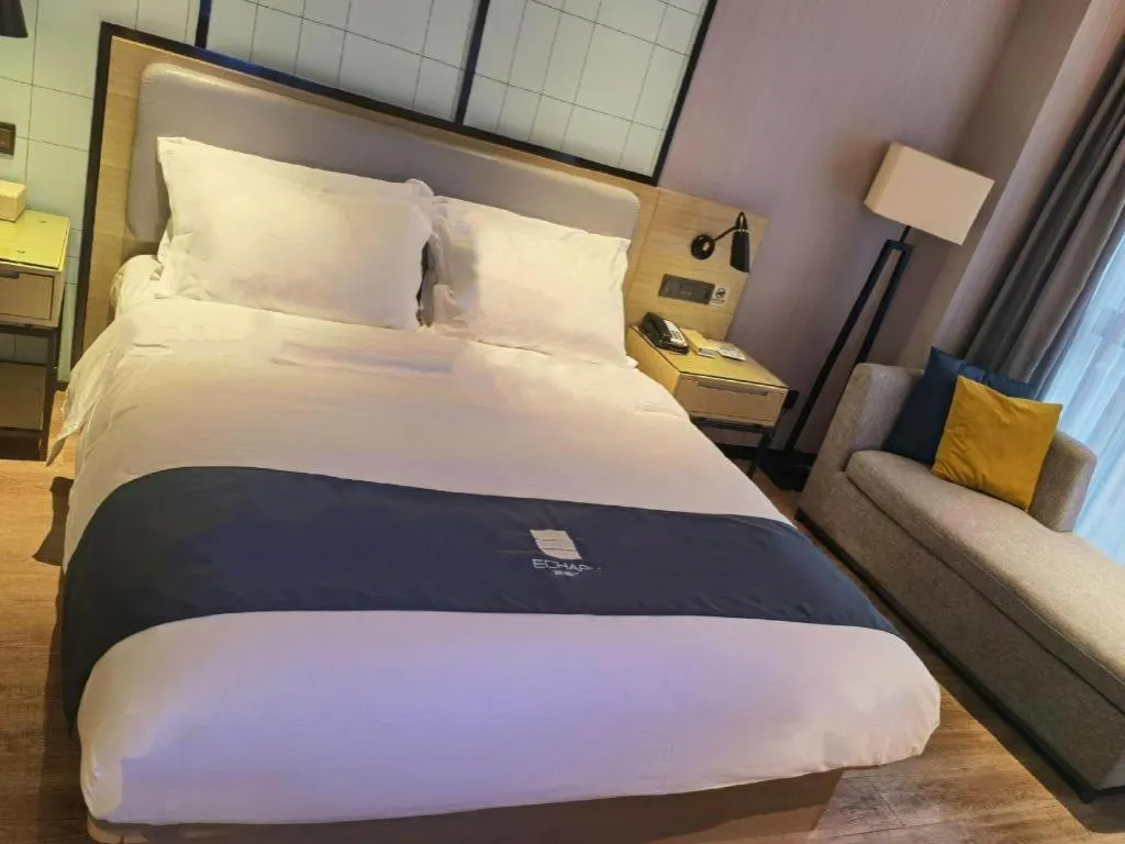 Bed in Echarm Hotel An'xi Hengxing Coach Station
