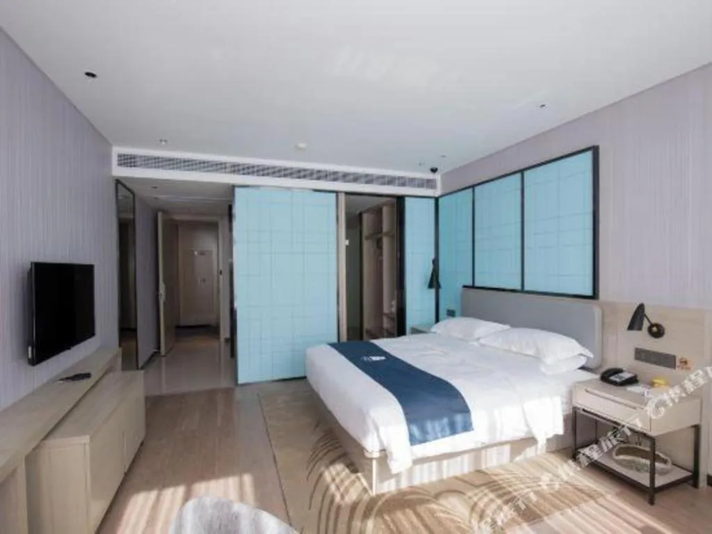 Bed in Echarm Hotel An'xi Hengxing Coach Station