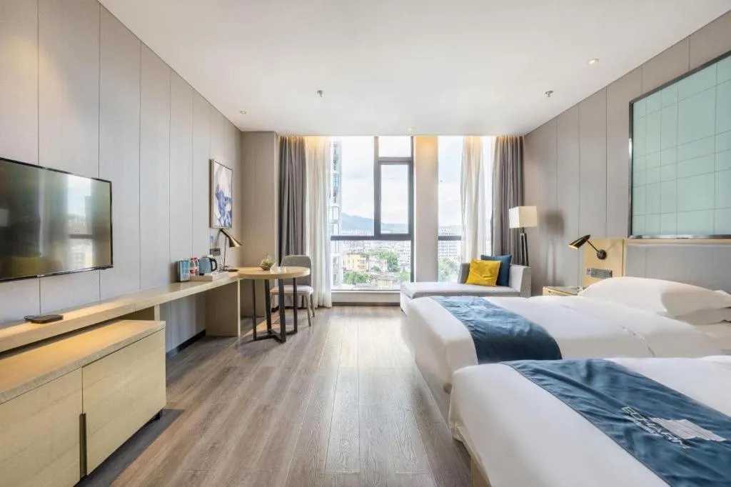 Bed in Echarm Hotel An'xi Hengxing Coach Station