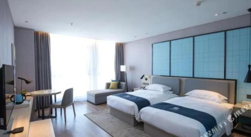 Bed in Echarm Hotel An'xi Hengxing Coach Station