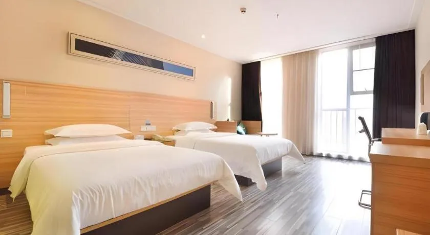 Bed in City Comfort Inn Wuhan Panlongcheng Baishang Shopping Center