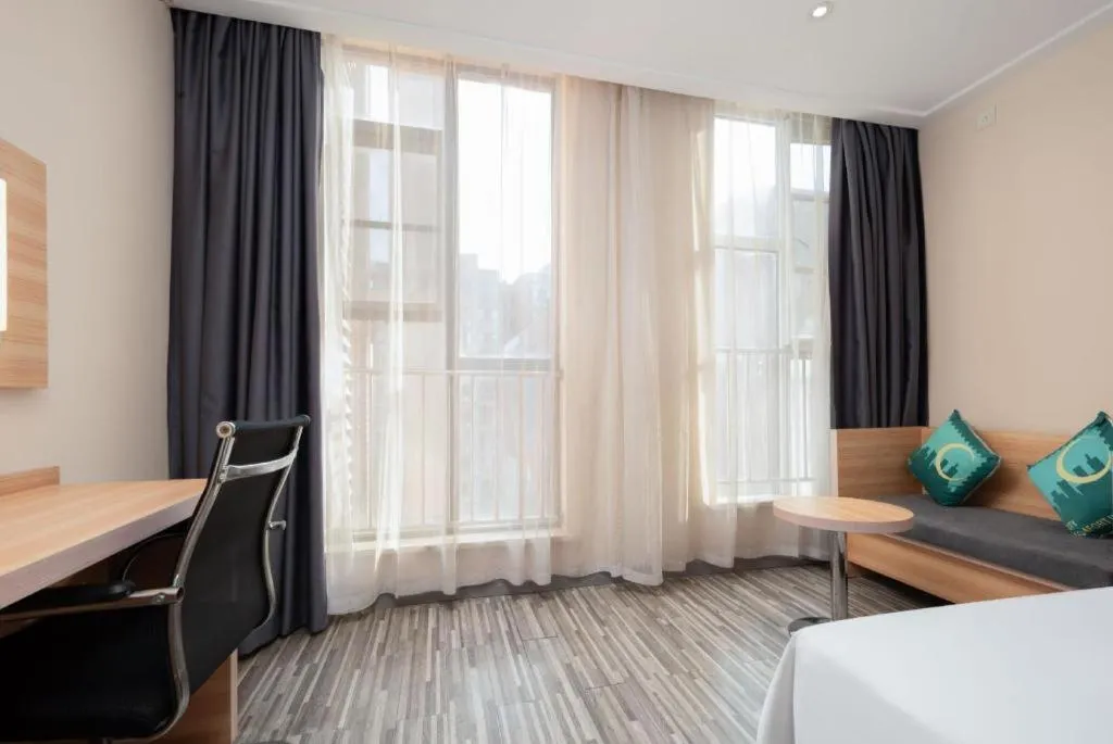 Bed in City Comfort Inn Wuhan Panlongcheng Baishang Shopping Center