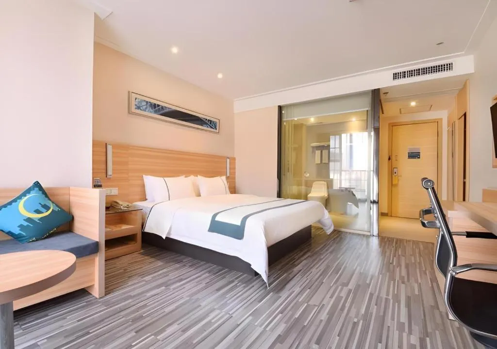 Bed in City Comfort Inn Wuhan Panlongcheng Baishang Shopping Center