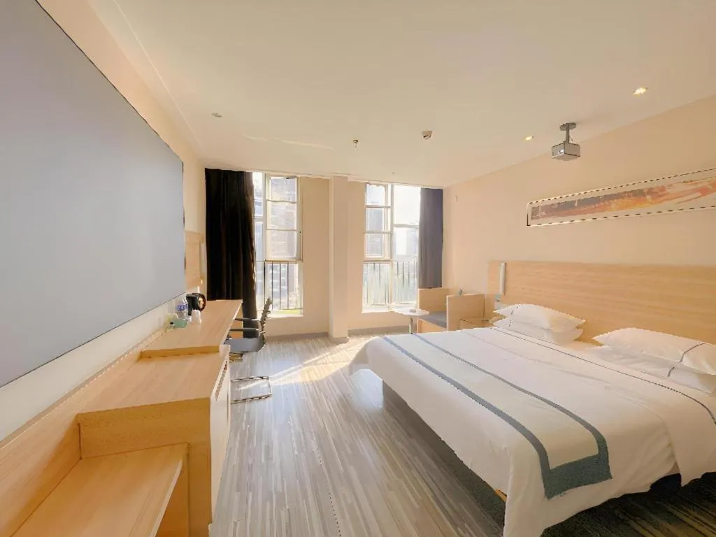 Bed in City Comfort Inn Wuhan Panlongcheng Baishang Shopping Center