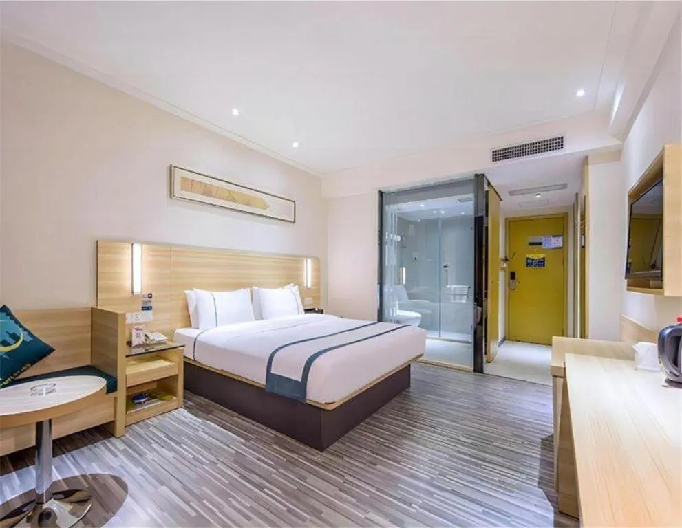 Bed in City Comfort Inn Wuhan Panlongcheng Baishang Shopping Center