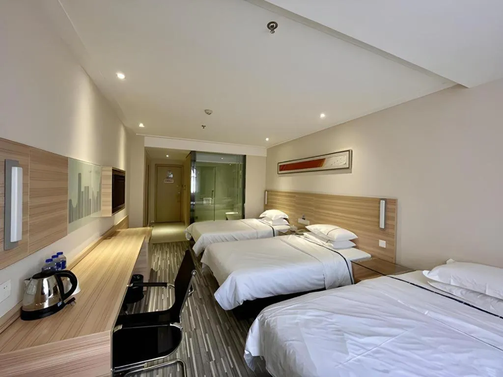 Bed in City Comfort Inn Hankou Railway Station Tangjiadun Wanda Plaza