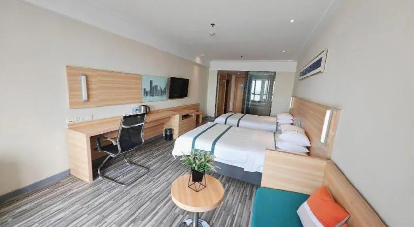 Bed in City Comfort Inn Wuhan Sports Center Sanjiaohu Metro Station