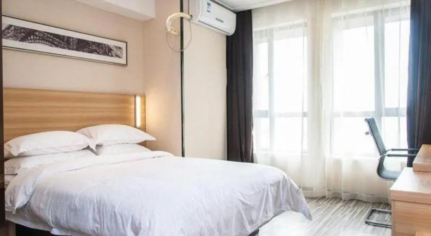 Bed in City Comfort Inn Wuhan Sports Center Sanjiaohu Metro Station