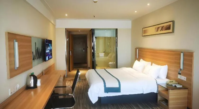 Bed in City Comfort Inn Wuhan Sports Center Sanjiaohu Metro Station