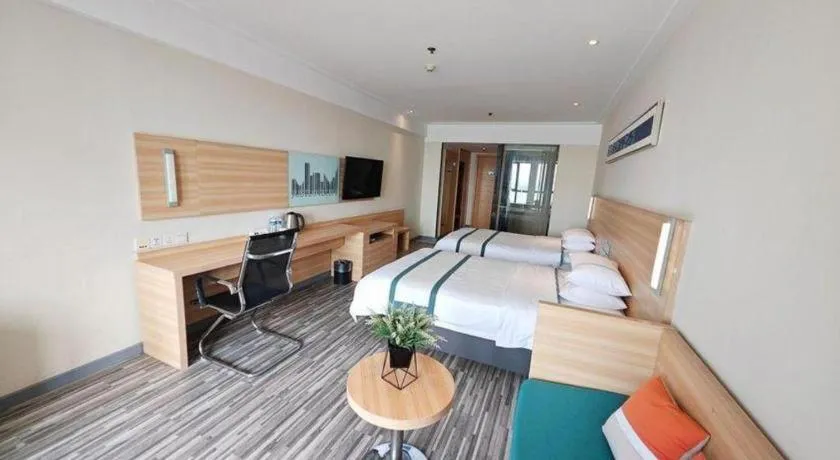 Bed in City Comfort Inn Wuhan Sports Center Sanjiaohu Metro Station