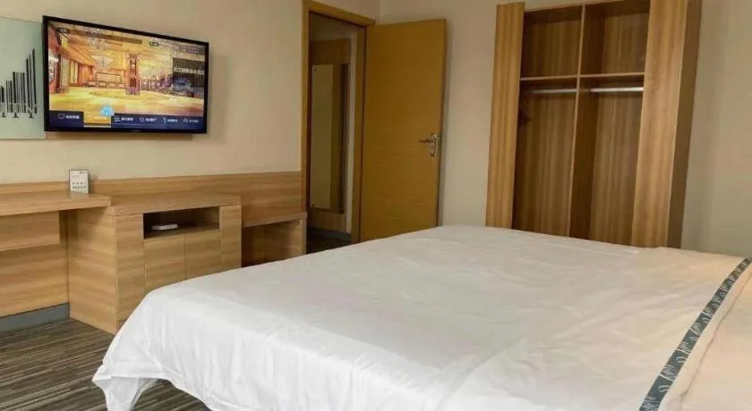 Bed in City Comfort Inn Wuhan Sports Center Sanjiaohu Metro Station