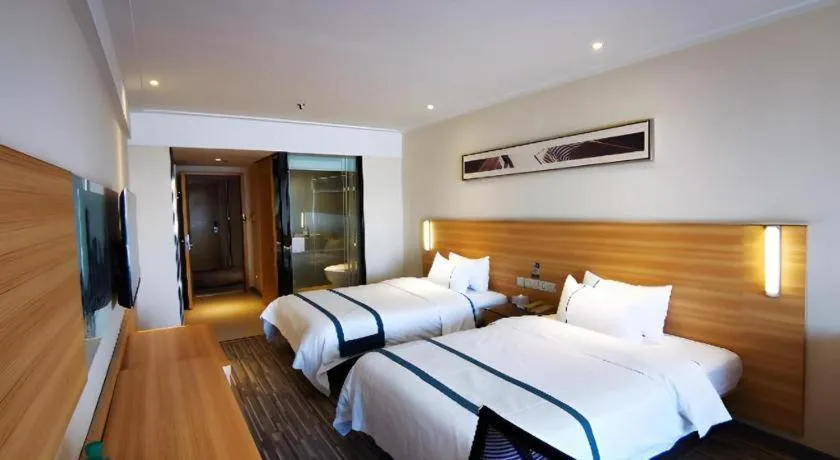 Bed in City Comfort Inn Wuhan Sports Center Sanjiaohu Metro Station