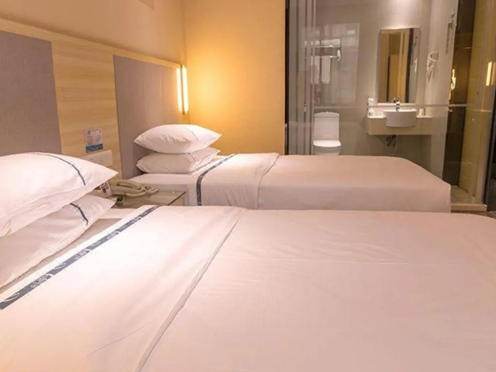 Bed in City Comfort Inn Guangzhou Zengcheng Yonghe Yongkang Road