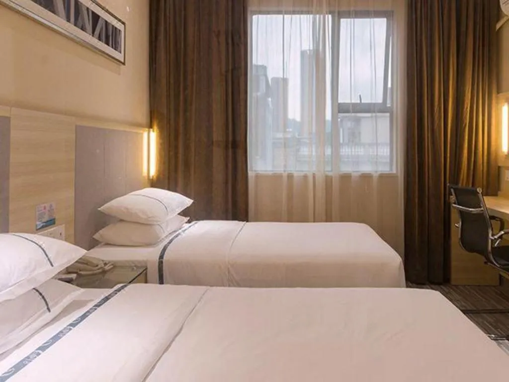 Bed in City Comfort Inn Guangzhou Zengcheng Yonghe Yongkang Road
