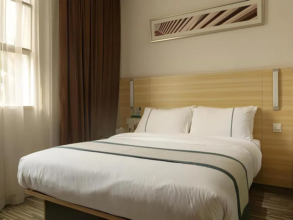 Bed in City Comfort Inn Guangzhou Zengcheng Yonghe Yongkang Road