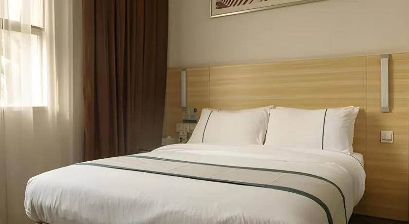 Bed in City Comfort Inn Guangzhou Zengcheng Yonghe Yongkang Road