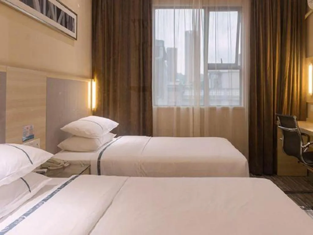 Bed in City Comfort Inn Guangzhou Zengcheng Yonghe Yongkang Road