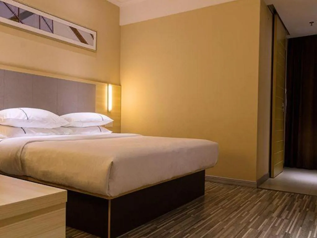 Bed in City Comfort Inn Guangzhou Zengcheng Yonghe Yongkang Road