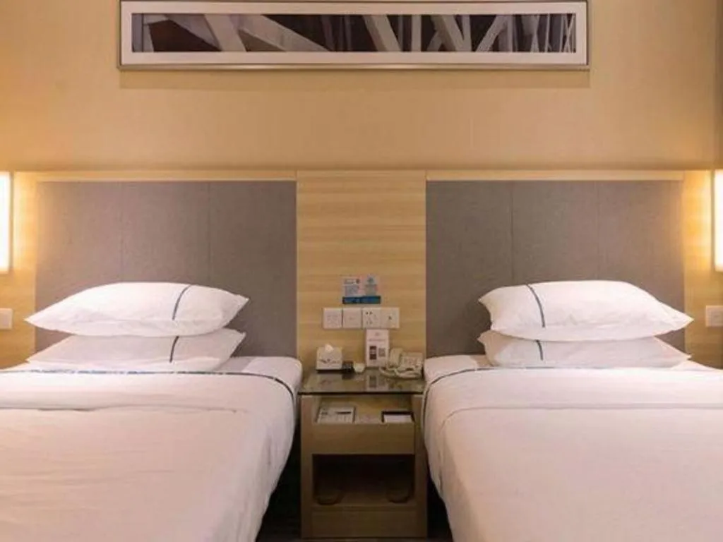 Bed in City Comfort Inn Guangzhou Zengcheng Yonghe Yongkang Road