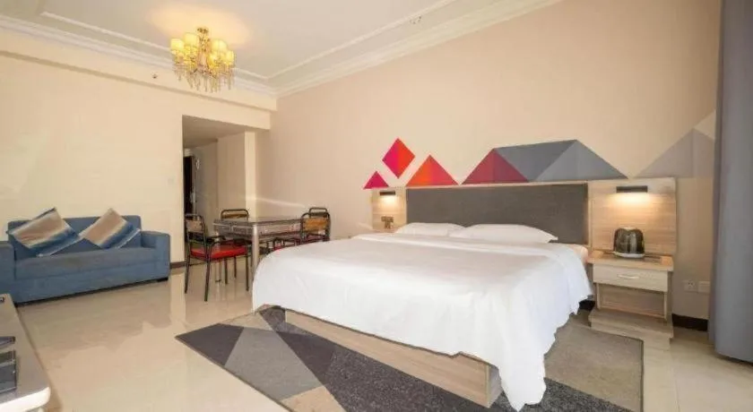 Bed in Borrman Hotel Guilin High-speed Railway North Station Evergrande Plaza