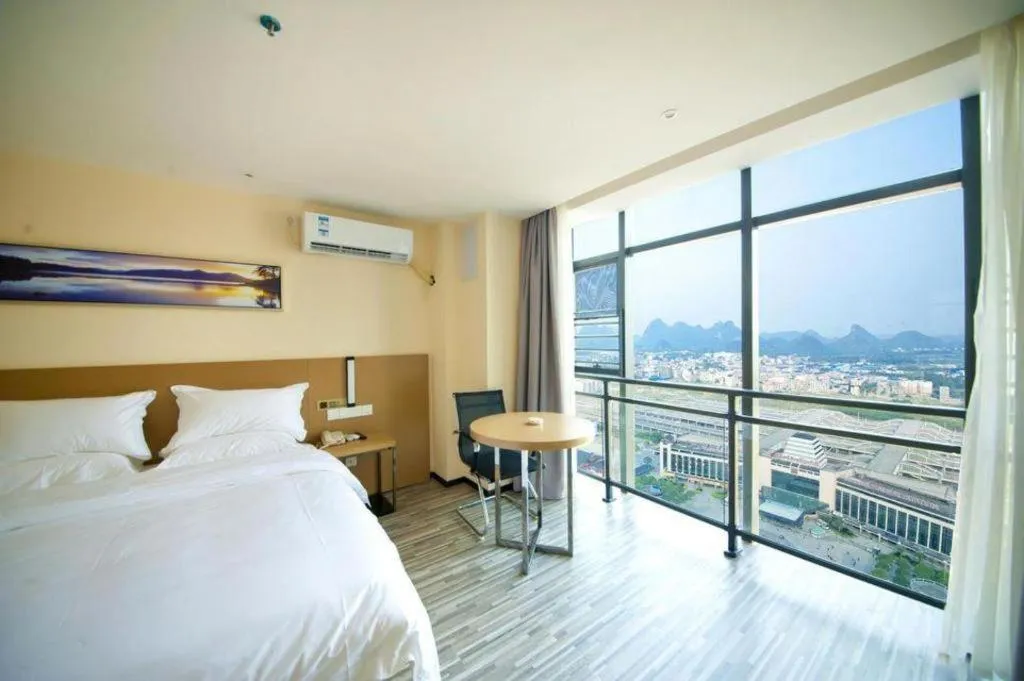 Bed in Borrman Hotel Guilin High-speed Railway North Station Evergrande Plaza