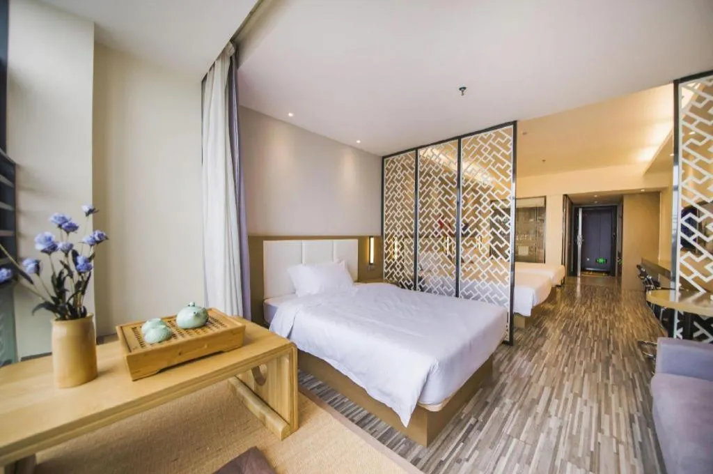Bed in Borrman Hotel Guilin High-speed Railway North Station Evergrande Plaza