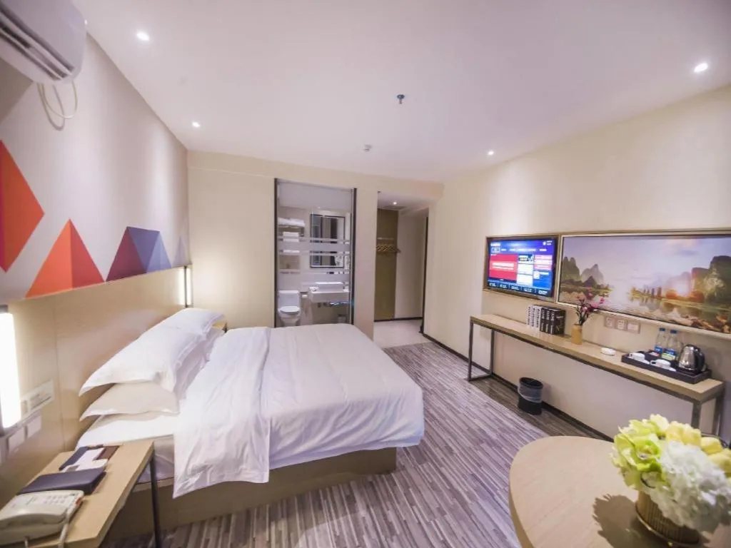 Bed in Borrman Hotel Guilin High-speed Railway North Station Evergrande Plaza