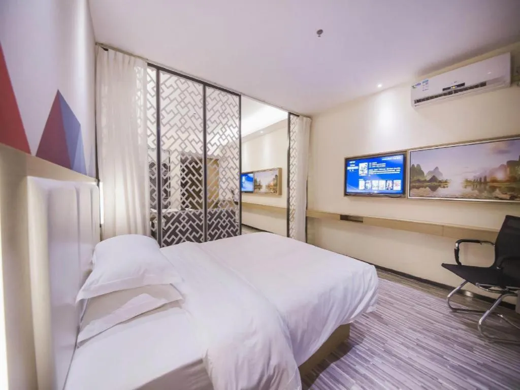 Bed in Borrman Hotel Guilin High-speed Railway North Station Evergrande Plaza