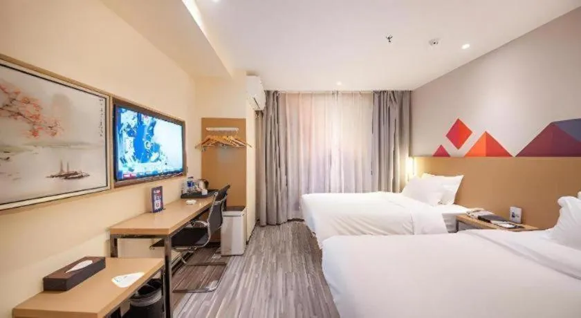 Bed in Borrman Hotel Guilin High-speed Railway North Station Evergrande Plaza