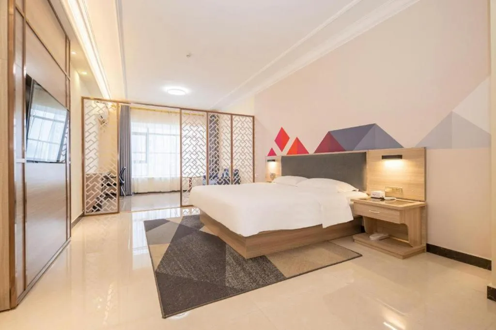 Bed in Borrman Hotel Guilin High-speed Railway North Station Evergrande Plaza