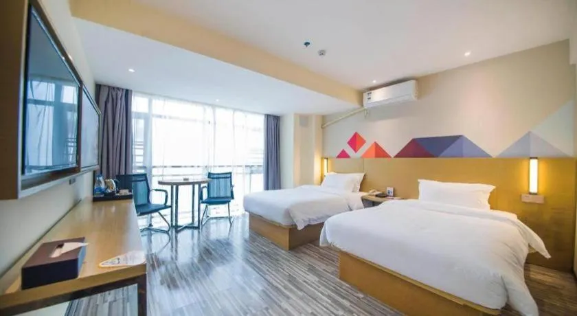 Bed in Borrman Hotel Guilin High-speed Railway North Station Evergrande Plaza