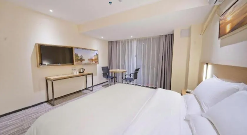 Bed in Borrman Hotel Guilin High-speed Railway North Station Evergrande Plaza