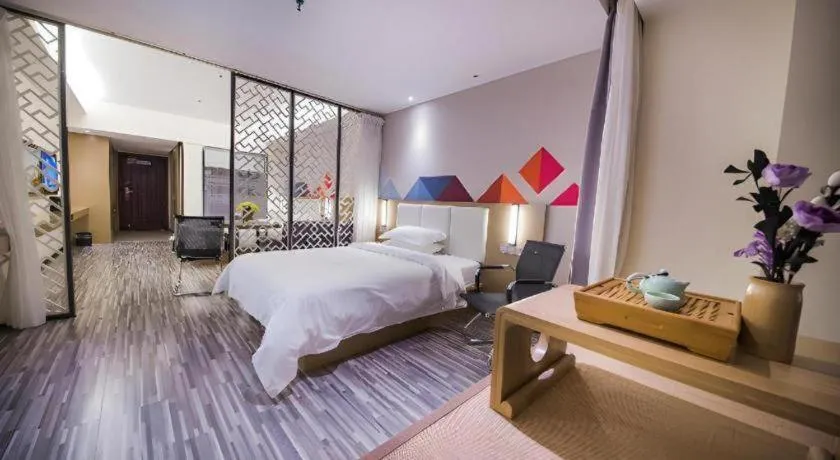 Bed in Borrman Hotel Guilin High-speed Railway North Station Evergrande Plaza