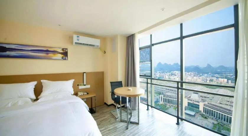 Bed in Borrman Hotel Guilin High-speed Railway North Station Evergrande Plaza