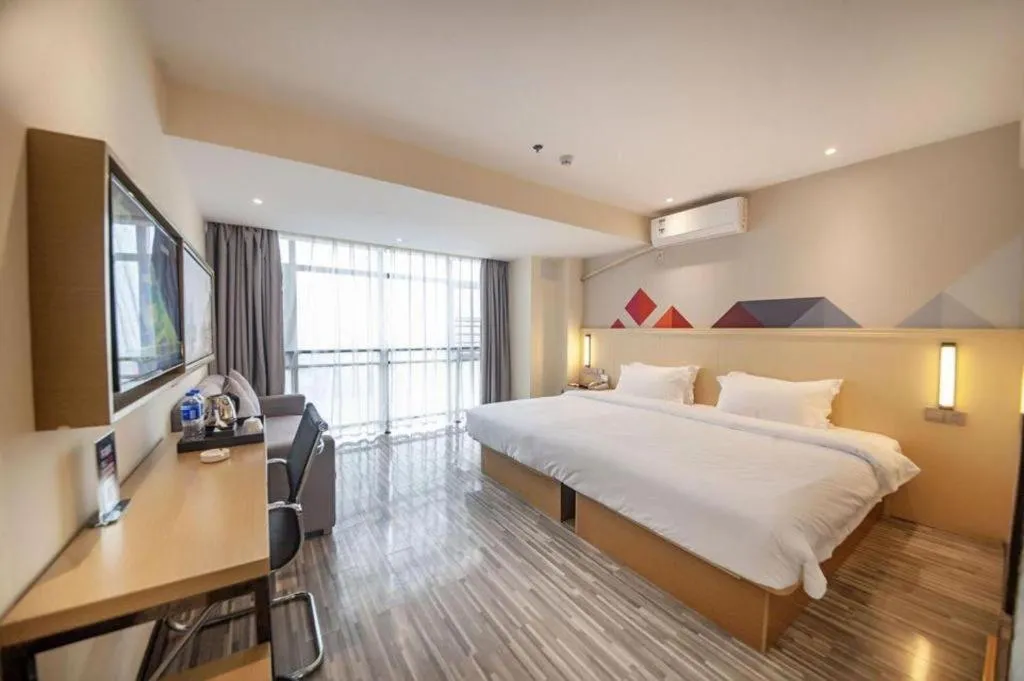 Bed in Borrman Hotel Guilin High-speed Railway North Station Evergrande Plaza