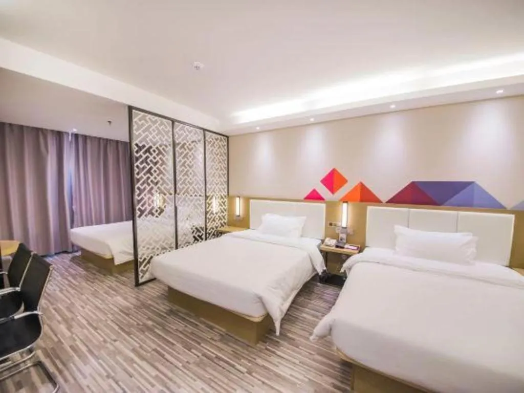Bed in Borrman Hotel Guilin High-speed Railway North Station Evergrande Plaza
