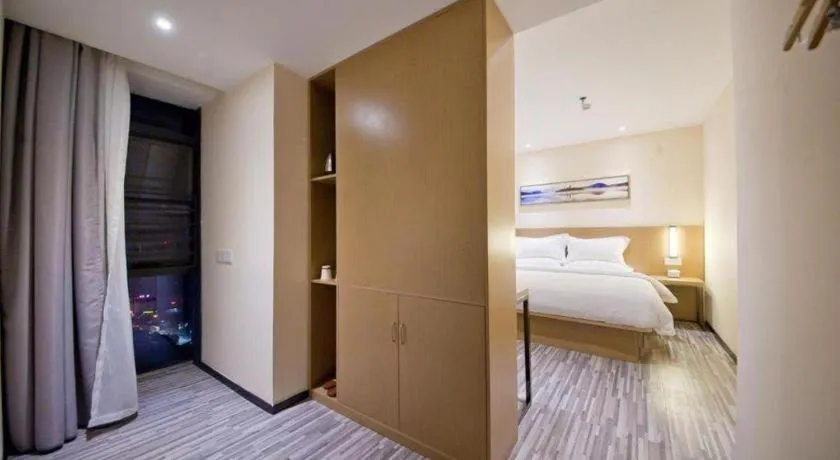 Bed in Borrman Hotel Guilin High-speed Railway North Station Evergrande Plaza