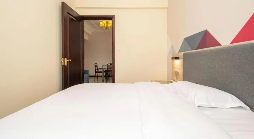 Bed in Borrman Hotel Guilin High-speed Railway North Station Evergrande Plaza