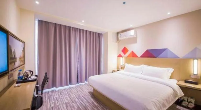 Bed in Borrman Hotel Guilin High-speed Railway North Station Evergrande Plaza