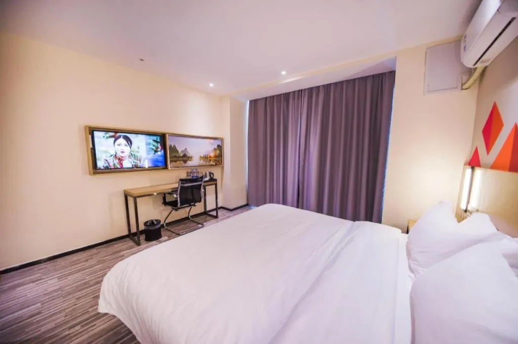 Bed in Borrman Hotel Guilin High-speed Railway North Station Evergrande Plaza